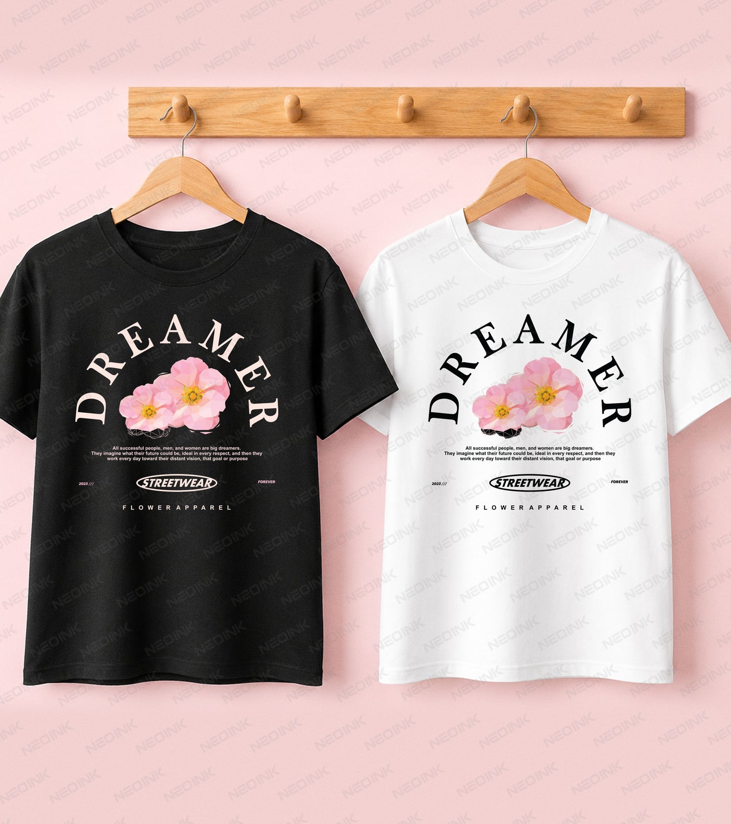 Black t-shirt featuring Dreamer typography above blooming pink flowers for a positive Good Vibes streetwear aesthetic.
