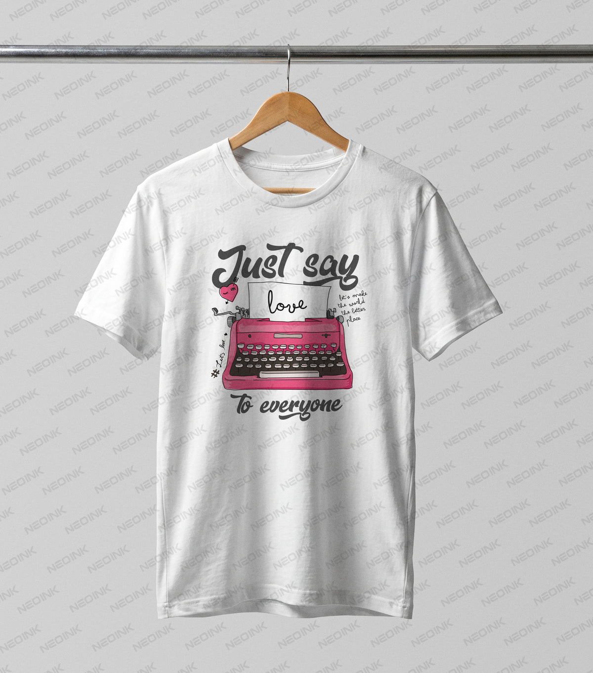Vintage pink typewriter typing out a love letter surrounded by positive quotes, provided as clean DTF transfers ready to print for aesthetic fashion.