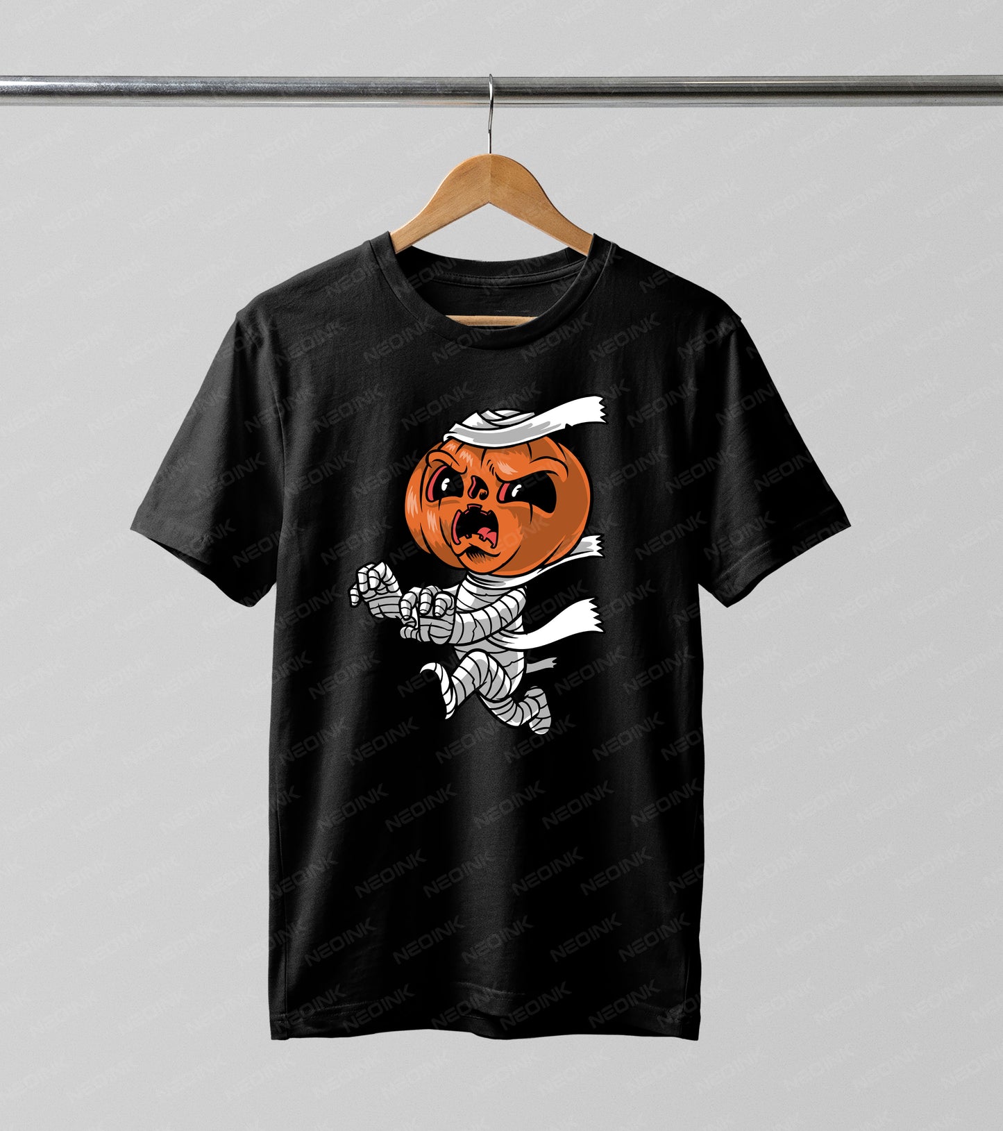 Add a fun and spooky twist to your Halloween apparel with this running mummy pumpkin DTF transfer. This energetic design features an angry jack-o'-lantern head on a cartoonish mummy body, complete with trailing bandages and a dynamic running pose.