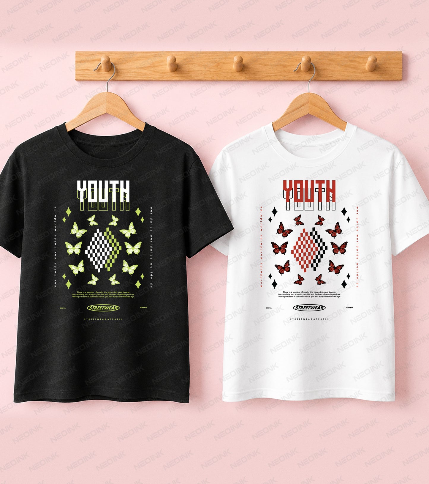 Black t-shirt with green butterflies orbiting a checkerboard diamond pattern and Youth text for a Good Vibes streetwear graphic.