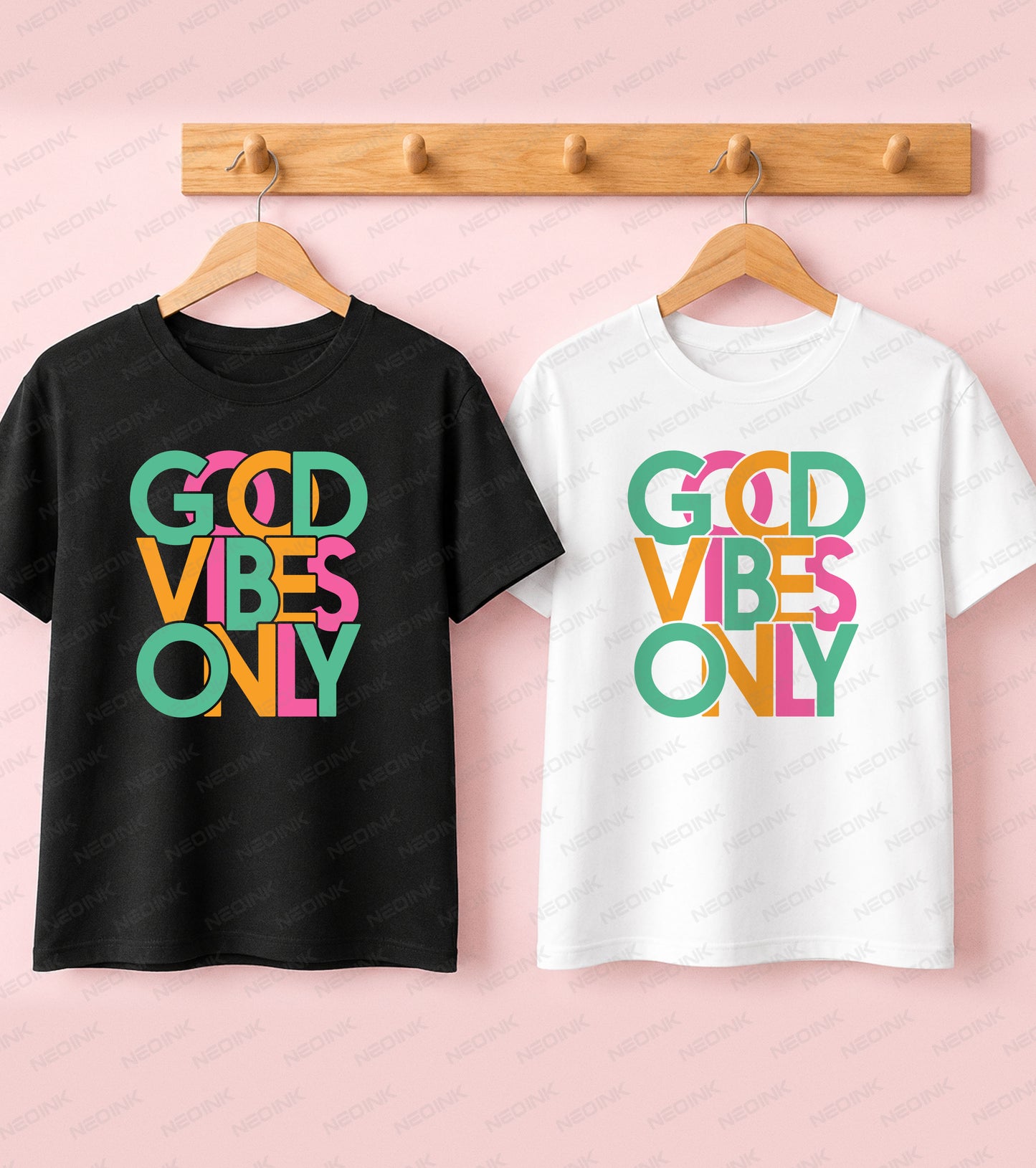 T-shirt featuring colorful, overlapping retro bubble typography reading Good Vibes Only in bright green, yellow, and pink, designed for both dark and light streetwear apparel.