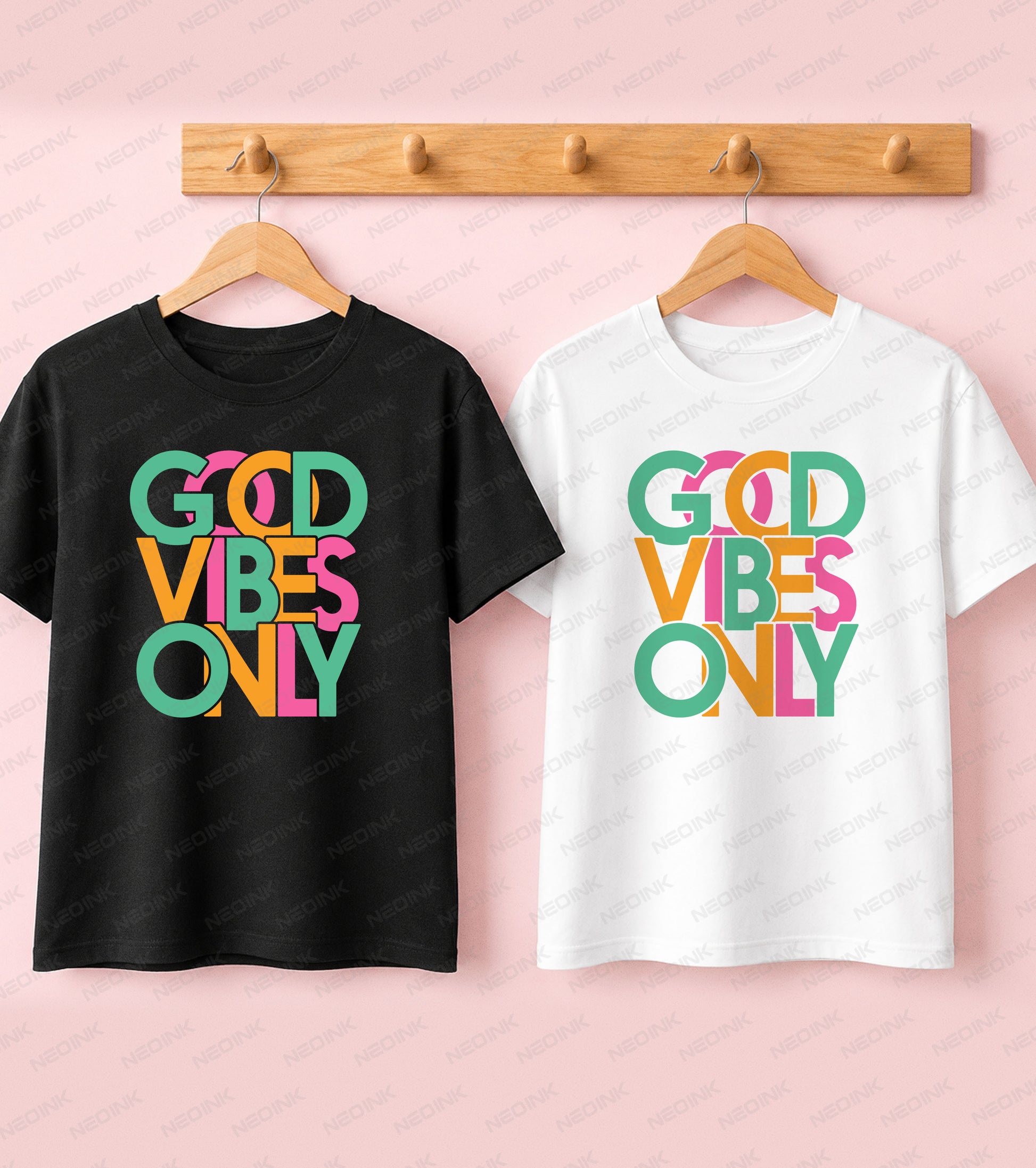 T-shirt featuring colorful, overlapping retro bubble typography reading Good Vibes Only in bright green, yellow, and pink, designed for both dark and light streetwear apparel.