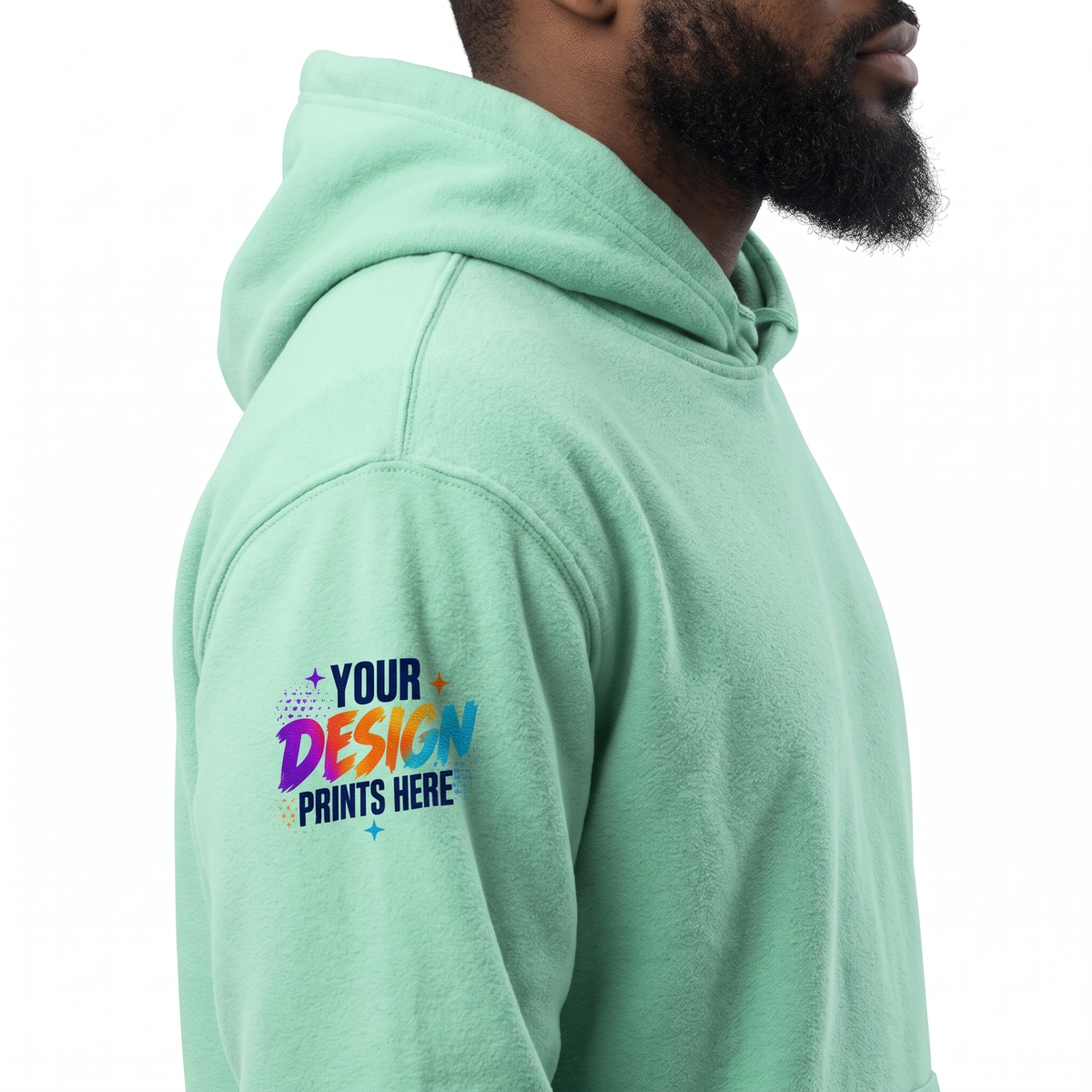 Close-up of a small custom sleeve print on a mint green hoodie