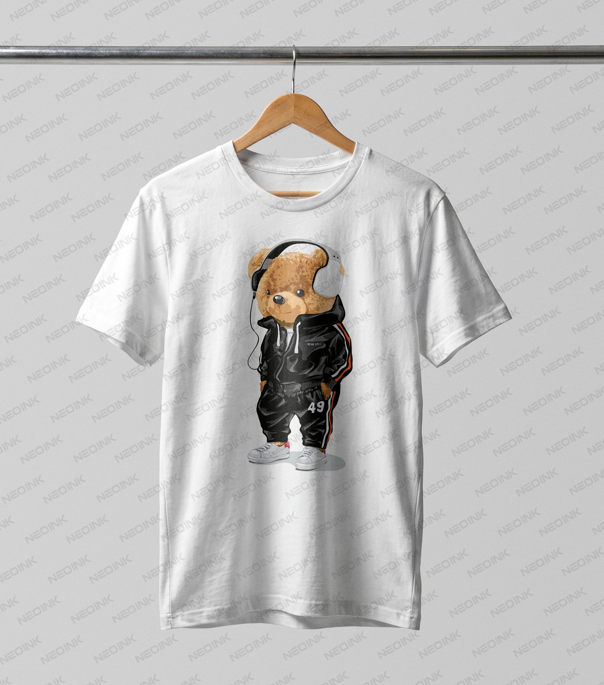 Stylish teddy bear rocking over-ear headphones and a sleek black tracksuit, easily applied using DTF transfers ready to print for sporty looks.