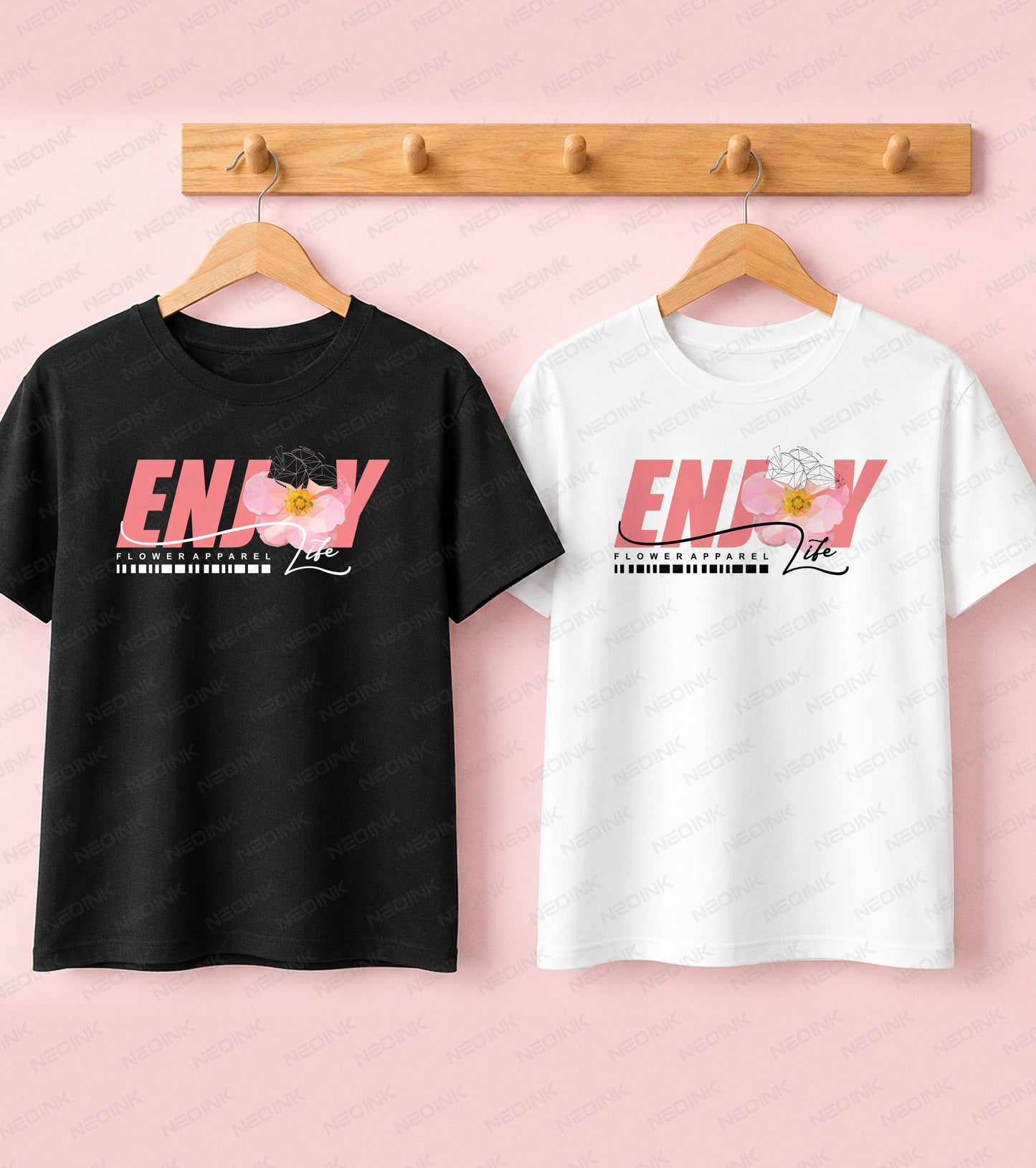 Black t-shirt displaying pink Enjoy Life typography and geometric floral line art for a Good Vibes streetwear look.