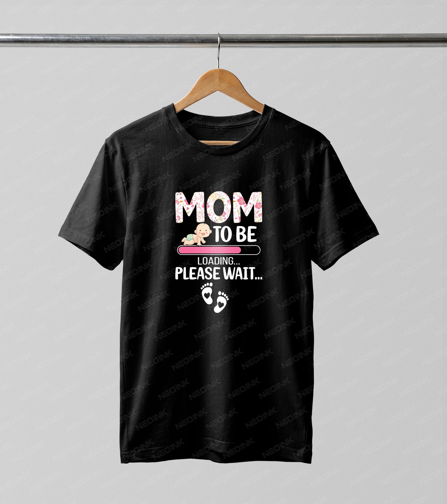 Celebrate expecting mothers with this "Mom To Be Loading" graphic featuring a pink progress bar and crawling baby, supplied as vivid DTF transfers completely ready to print.
