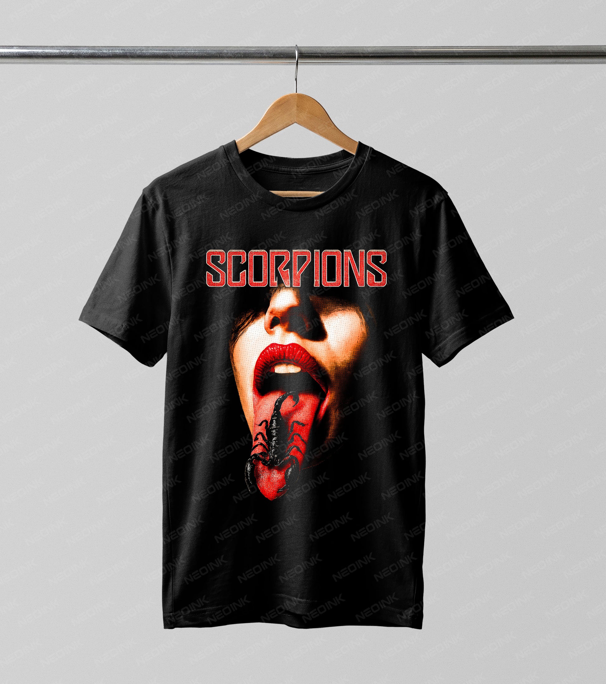 Scorpions Halftone DTF transfer. This bold graphic features a close-up of a face with vibrant red lips and a black scorpion resting on the tongue, finished with a classic vintage Halftone dot pattern.